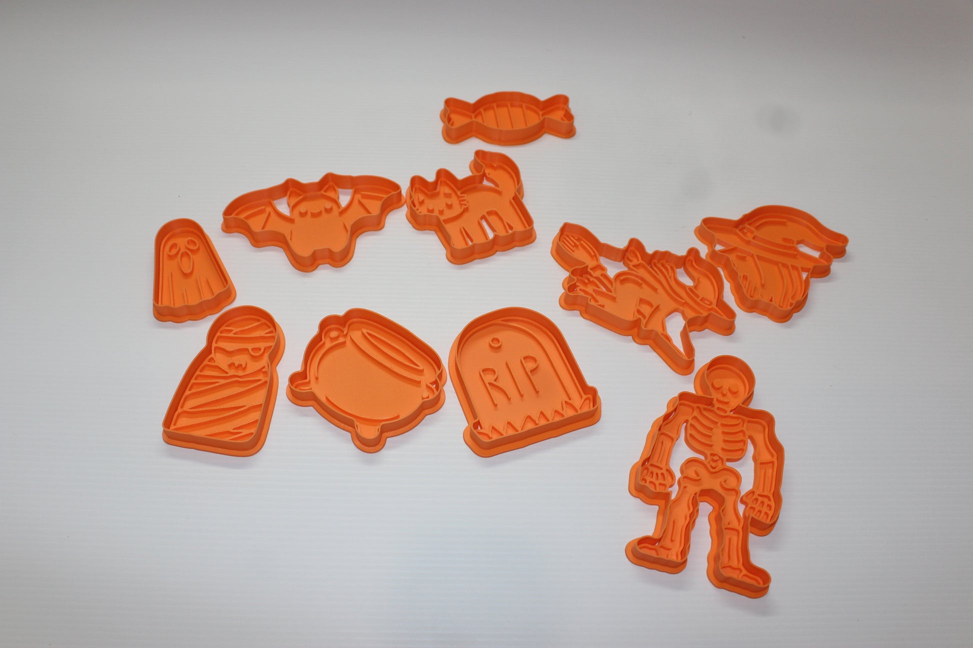Set of Halloween-themed cookie cutters on a white background