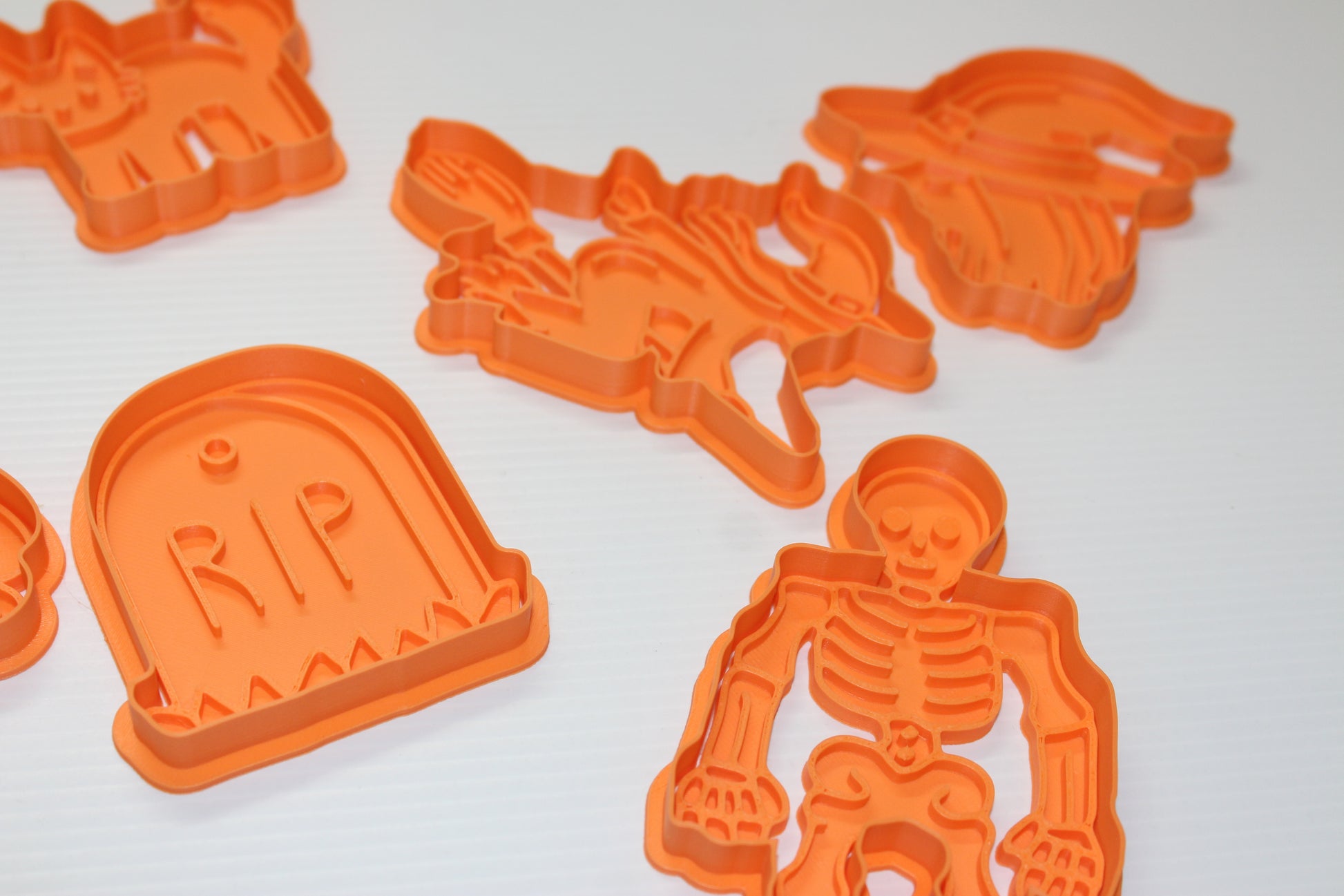 Halloween-themed cookies made with 3D printed cutters